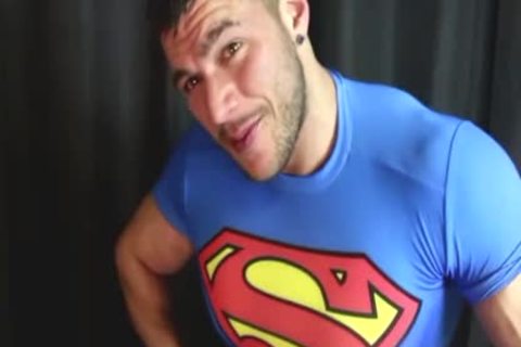 Superman Flexes His large Muscles