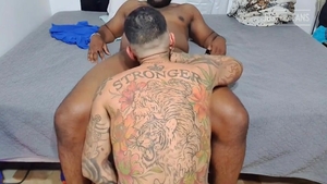 Pablo Bravo & large dark Bear